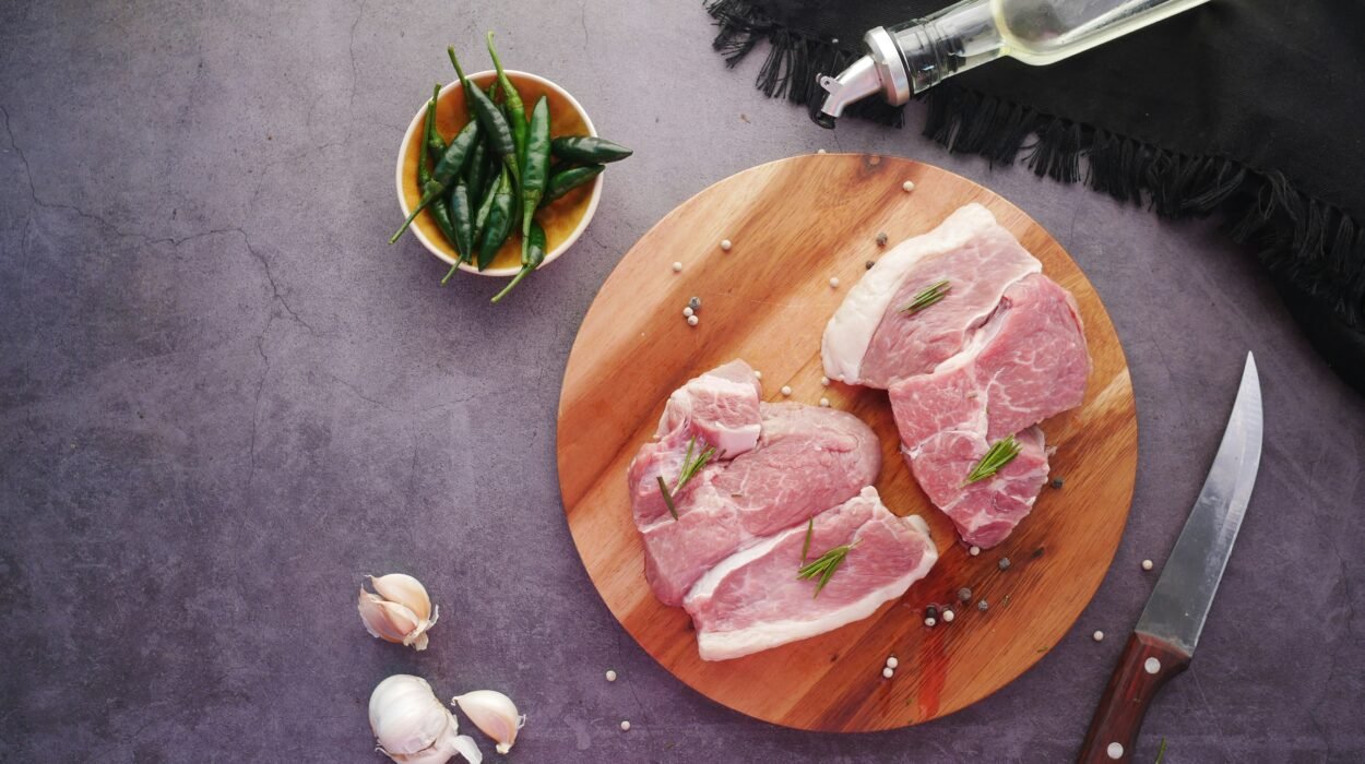 sliced meat on brown wooden chopping board